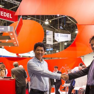 riedel vietcoms partnership handshake